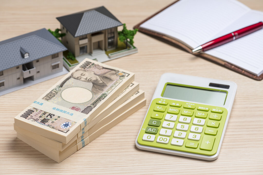 ⑤札束（お金）と住宅模型
